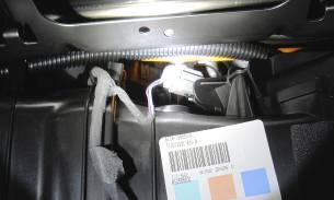 INSTALLING CAN BUS WIRING HARNESS Note: A hole must be drilled so that the controller area network (CAN) bus harness can be routed from the interior into the engine compartment. 1.