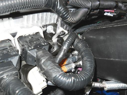 Following the Ford chassis harness. Note: Make sure to secure the ROUSH CleanTech underhood harness to keep it away from the steering column and other heated or moving components. Figure 16.4. 12.