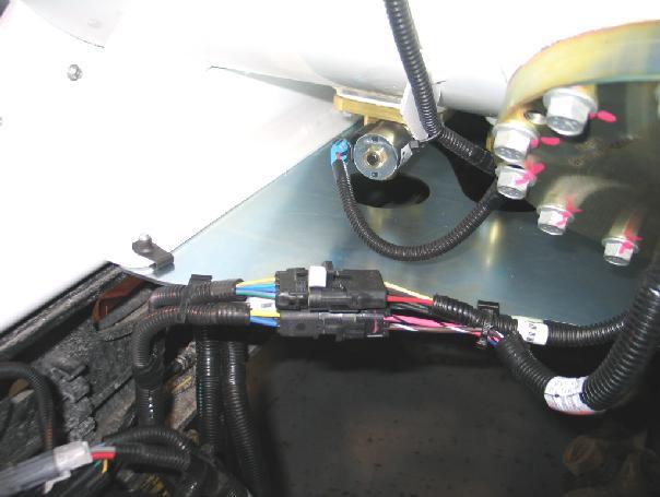 9. Tighten the four heat shield bolts to specification. Figure 24.1. 10. Install supply valve and level sender harness (solenoid harness P12EB-18K377-B) across the tank.