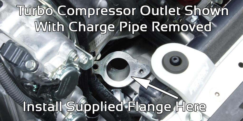 11) Install flange to turbo using (2) bolts removed in earlier steps. Tighten bolts to 15ft-lbs. 12) Remove bypass valve from OEM charge pipe.