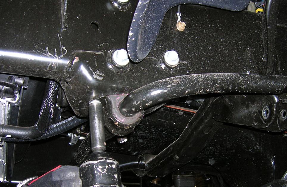 If a longer shock is installed, the coil spring can fall out when the vehicles suspension is at full droop. 25. Locate (2) 35130-08 front brakeline relocation brackets.
