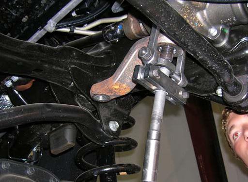 Remove the threaded sleeve from the tie rod and save.