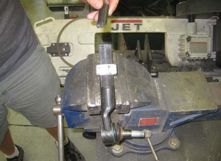 Remove the outer tie rod that will connect to the newly end to the pitman arm using