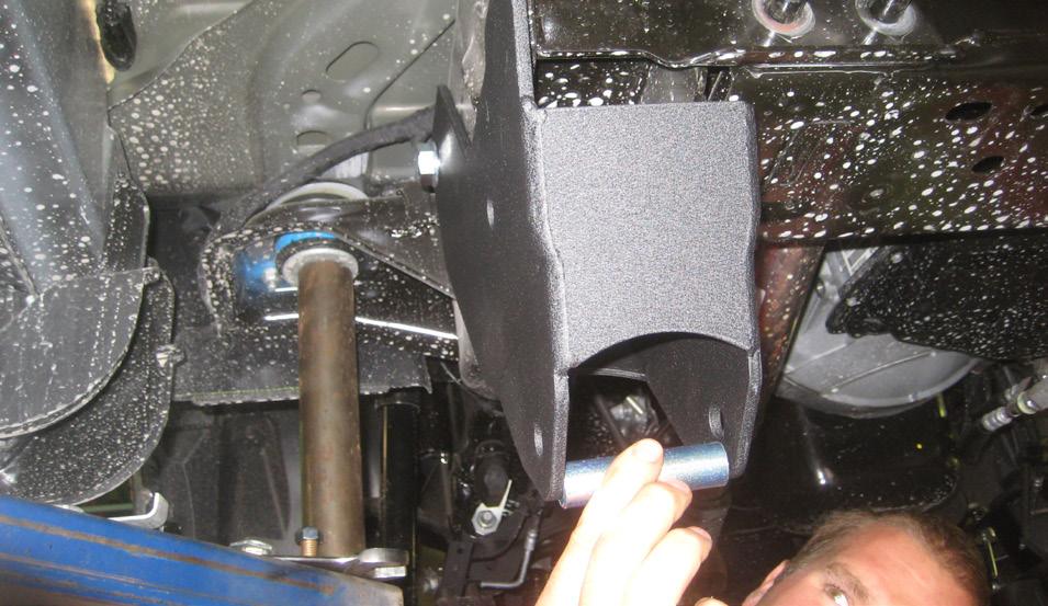 into the forward upper hole, install the S10257 crush sleeve into the OE pocket and