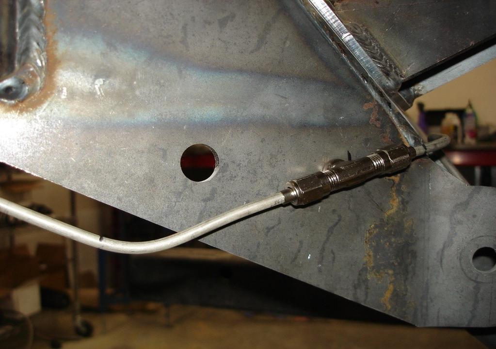 4. Install the Bulk head T into the sub frame mounting holes with the long leg through the frame.