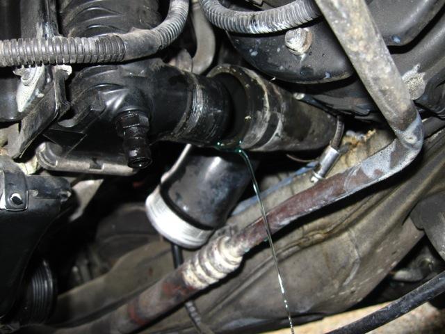 13) remove upper radiator coolant hose
