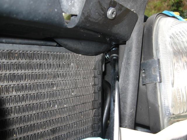 Driver s side bolt (shown below). The bolt on this side is more difficult to reach.