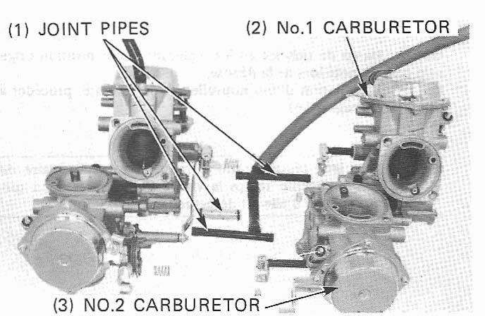Carefully separate the No. 1 carburetor from the assembly.