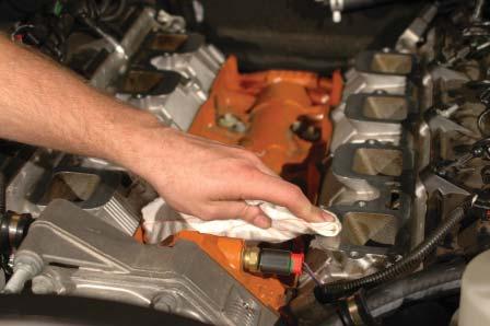 Remove the tape or rags from the top of the engine heads. 99.