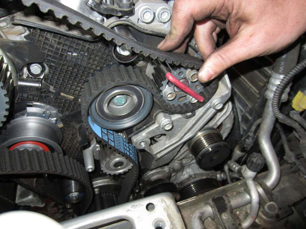 56. Install timing belt by starting at the crankshaft working your way to the