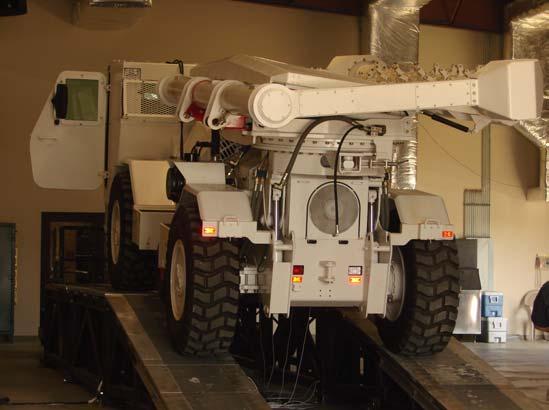 The Hydrema also has its flail system rotated and stowed on the rear of the vehicle (Figure 4). All the chains and hammers for the system have been removed for transport. Figure 4.