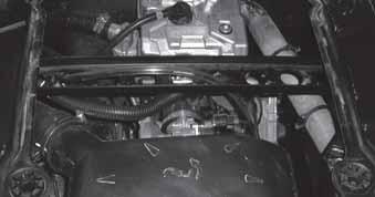 MAINTENANCE Spark Plug Spark Plug Removal and Replacement 1. Remove the rear access panel in the cargo box. 2. Remove the spark plug cap. 3.