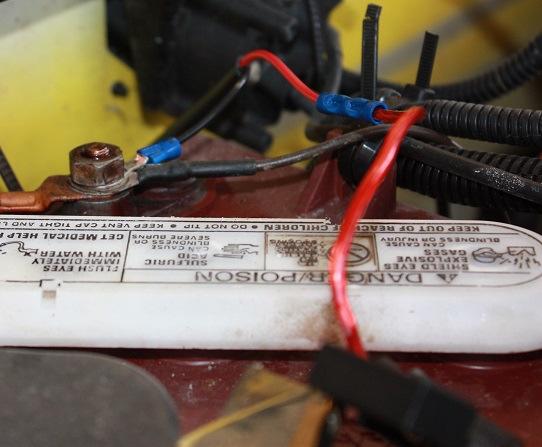 Remove nuts from battery terminals.