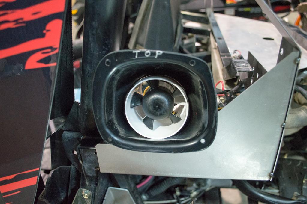 rear fender and air horn from RZR. Place on a flat surface and mark the lower air horn mount holes on the back of the fender using the top marks as a guide. Using a 3/16 bit, drill out the four holes.