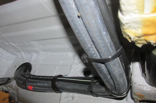 11. Leave the Evaporator Harness inside the vehicle at the entrance to the hole.