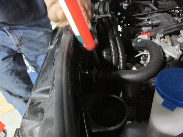 Also apply silicone behind the water valve and any locations where hoses come in contact with any vehicle structures (Figure 67), especially OEM related components. Seal Figure 66 Seal Figure 67.