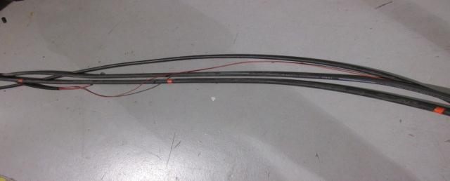 Install the entire wire loom. The small red wire will have an excess length that will be used later (Figure 3).