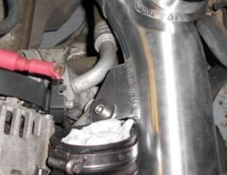 Slide the other end onto the throttle body. It is a tight fit and has to be aligned correctly to slide on fully. 19.
