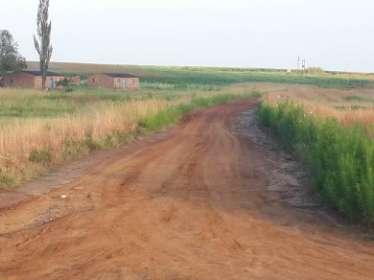 road as depicted in the photos below.