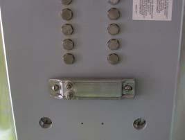 De-energize panel, open circuit breaker enclosure and make sure bolts are retracted in cover. 2. Remove operator plug from desired position and install operator bearing.