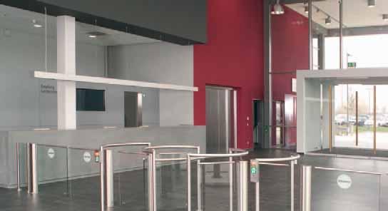 Charon half-height turnstiles and swing doors Stylish access control «The inauguration of our new head office was a great sucess. The entrance hall is spacious, transparent and open.