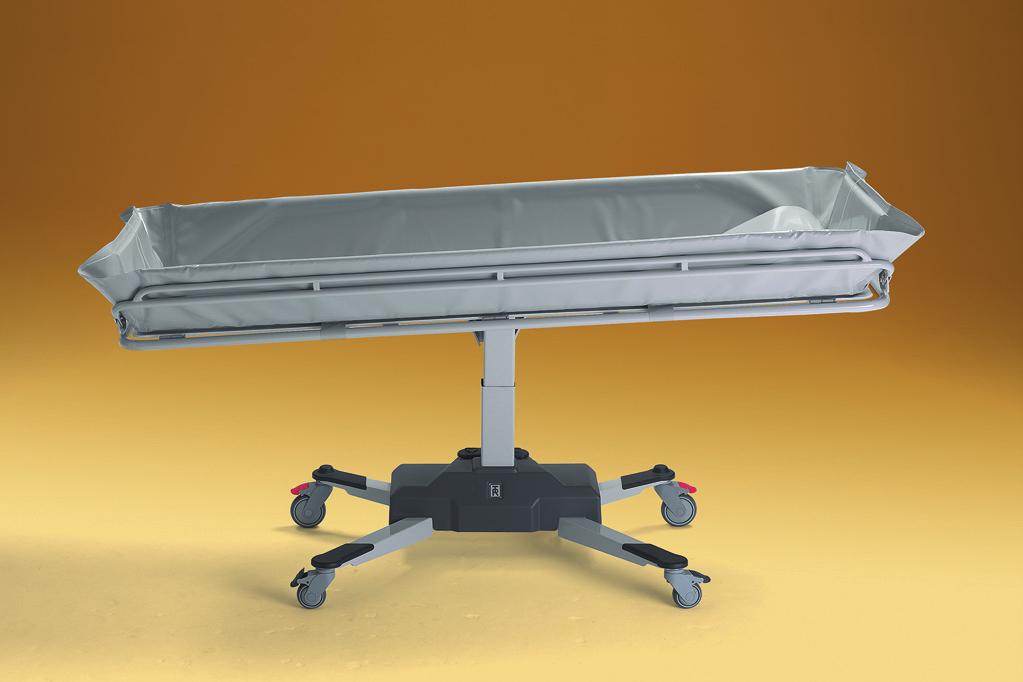 mounted column, allowing the trolley stretcher to overlap the bed further for a safe and easy patient transfer.