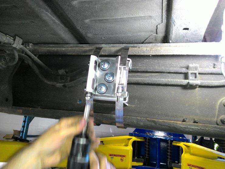 Position the frame mount bracket on the inside driver side of the frames C-channel and determine mounting location.