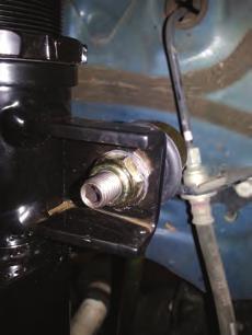 Reattach the brake line tab (fig.