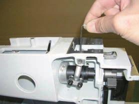 Remove take-up lever crank.