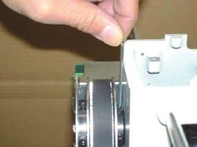 Loosen the screw on drive pulley