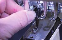 Referring to [3-5-2 Adjustment of retainer on rotary hook] adjust retainer on bobbin case holder