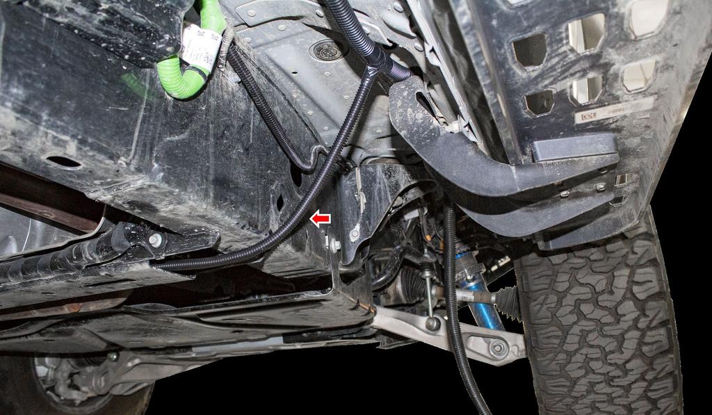 Using the supplied splice connector, connect the orange wire from the supplied harness to a wire on your vehicle