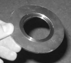 You may find that a small screwdriver or pick maybe useful to push the ring down so that it seats on the