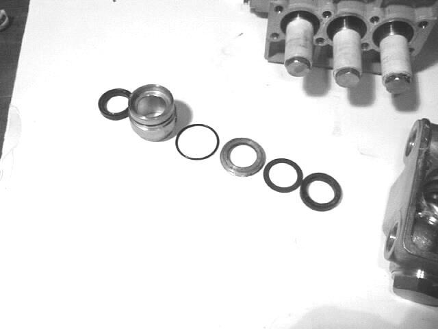 remove spacer (30A), and o-ring (31). Inspect all parts for wear and replace as necessary. 3.
