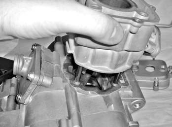 DISMANTLING THE CYLINDER AND PISTON - Drain the coolant from the engine. - Remove the cylinder head cover and the cylinder head. - Extract the cylinder by pulling it upwards.