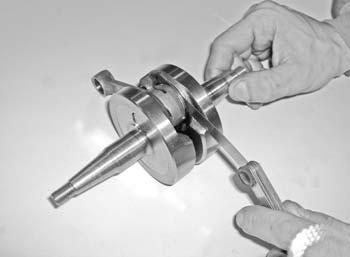 - Clean and completely degrease the crankshaft assembly, and then examine it carefully.