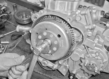 DISMANTLING THE ALTERNATOR MAGNETO - Remove the gear change lever and the alternator