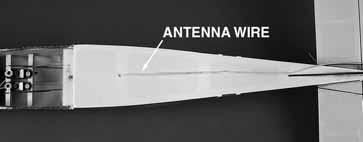 Install the Top Wing 10. Secure the aileron servo hatch to the wing with four 2 x 7mm self-tapping screws.