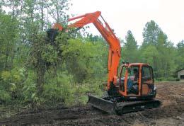 The Kubota KX080-3's large auxiliary oil flow allows you to attach a