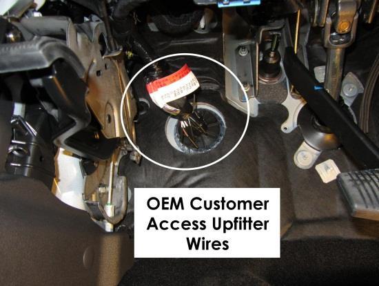 Figure 2. Location of ground connection. 9. Locate the OEM customer access upfitter wiring, under the dash, behind the brake pedal. See Figure 2. Figure 3. Customer Access wires. 10.