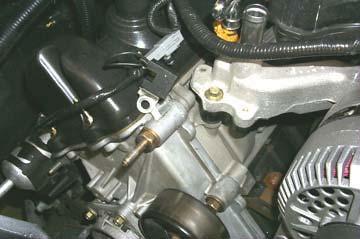 Remove the o-ring and thermostat from the manifold.