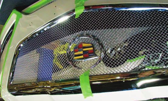 Align the factory grille shutters over the back of the E&G Classic grille,