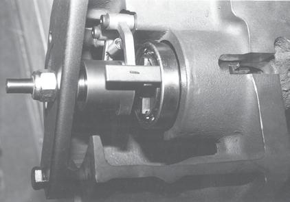 . Before shimming the Handwheel Assembly and to assure proper Handwheel Lug (piece 3-) engagement with the Clutch (piece 9-), push the Declutch Lever into the MANUAL mode until Latch 3- is engaged