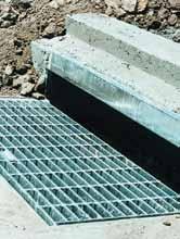 GG57D Gully Grate Skirted Base & Lintel > Load Class D > Suitable for sub-divisions > Internal clear opening 900mm x 400mm > Three-sided frame with lintel, matched to road camber > Hinged grate