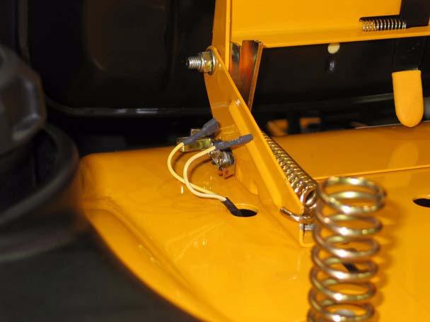 39.7. The Seat Safety Switch consists of a pair of simple metal contact tangs attached to the seat mounting bracket. See Figure 39.7. Insulator Seat safety switch 39.8.