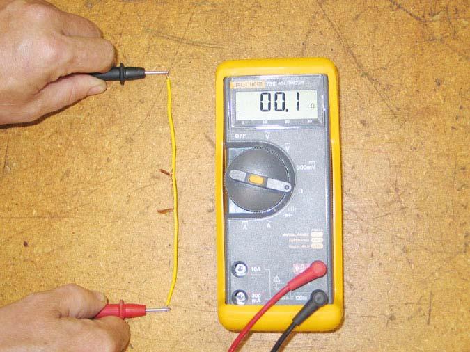 39.17.As a point of illustration, a short length of 12 or 14 gauge stranded wire can be stripped at the ends to facilitate an Ohm reading. See Figure 39.17. 39.19.