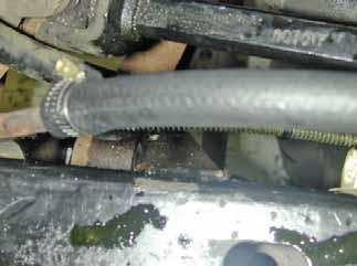 Secure the supplied power steering hose with a hose