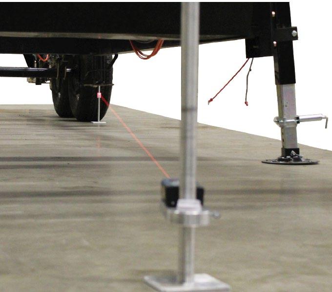 5. Align the laser with each target (Fig.28) and record the measurements on the customer form. 6. Measure the center-to-center distance between the hubs on both sides of the trailer.