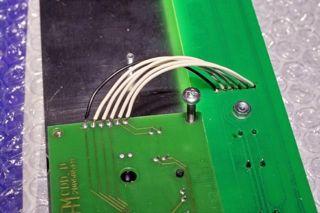 15. Mounting the display PCB Solder the remaining 5 pieces white wire, remove the 2 temporarily