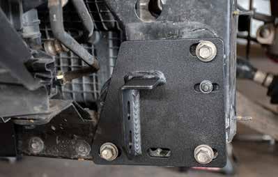Verify radiator bracket bolts are tightened.